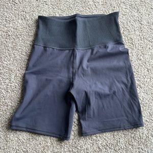 Dusty blue Vuori bike shorts